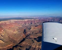 Image of airplane flying over the Grand Canyon