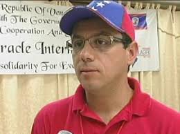 alexander yanez. Eye care patients crowded the conference room of the City Center, luggage in hand and ready to board a flight to Venezuela for treatment. - alexander-yanez-300x224