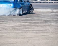 closeup of a drifting car's wheels