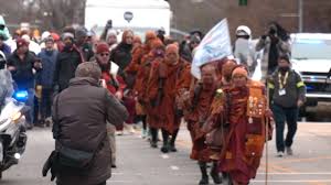 The Monks | Thousands gather at NC Capitol to see 'Walk for Peace'
