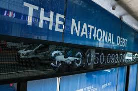 A chart showing the growth of US national debt over time reaching $40 trillion