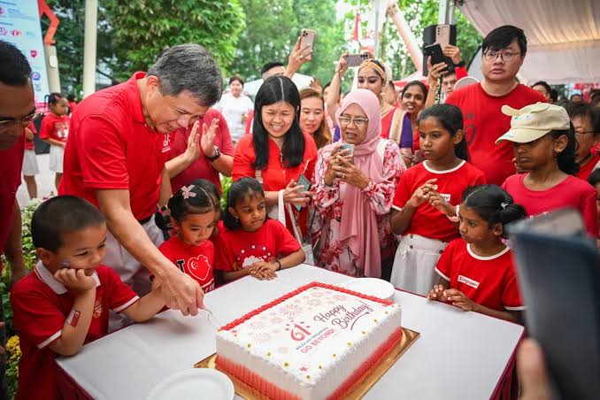 Singapore marks 61st National Day as Chan Chun Sing praises behind-the-scenes efforts; parade returns to National Stadium under 'Go Beyond!'