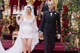 All About Kourtney Kardashian's 4 Wedding Dresses, Including Her Veil's Sweet Nod to Husband Travis Barker