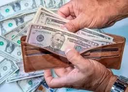 Dólar cerró a la baja tras reducción de tasas de la Reserva Federal