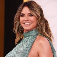 Heidi Klum Almost Breaks Cannes Film Festival Dress Code By Wearing A Semi-Sheer Corset & Skirt