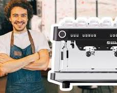 Hình ảnh về barista using Nuova Simonelli coffee machine