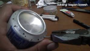 Hasil gambar untuk cara membuat kompor dari kaleng minuman bekas