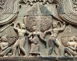 An elegant Apsara dancer carved from wood