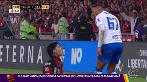 Pulgar vibra em dividida no final do jogo e inflama o Maracanã