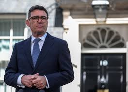 Burnham takes over as PM, pledges break from past