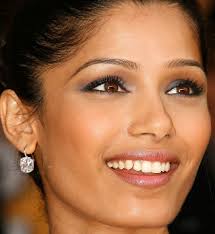 Freida Pinto Smile Look Beach. Is this Freida Pinto the Actor? Share your thoughts on this image? - freida-pinto-smile-look-beach-406211084