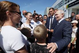 Putin pays his first visit to Pacific island chain claimed by Japan, drawing a protest from Tokyo