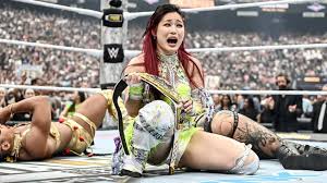 Iyo Sky Eyes Dream Tag Team with WWE Legend Rey Mysterio