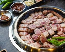 Jungmun Doldam Black Pork restaurant with grilled black pork的圖片