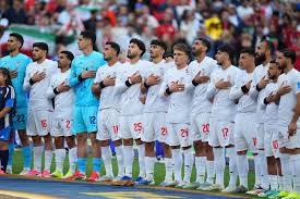 Iran narrowly knocked out of tumultuous World Cup on Austria’s last-second goal