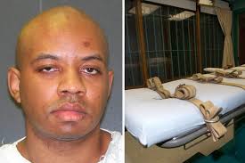 WAITING FOR DEATH: Ray Jasper, a rapper from Texas, is set to be executed in just a few hours for the 1998 murder of David Alejandro [GETTY/REUTERS] - 5329ed2b8d80d_Untitled1