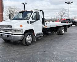 Image of flatbed tow truck in Western Tehran