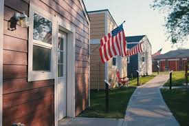 Inside the ‘family style’ tiny home villages across America where residents pay zero rent for fully furnished properties