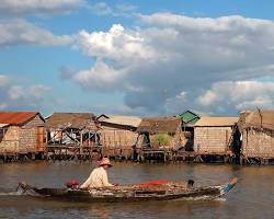 A floating village with houses on stilts on Tonle Sap Lake