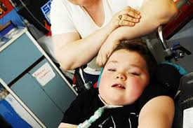 A PARALYSED boy has been trapped in hospital for a year - while £50,000 of medical gear lies unused at his home. Alex McGregor is stuck in a ward 30 miles ... - alex-mcgregor-with-mum-joanne-image-2-771205703