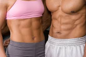 Woman and man with six pack abs