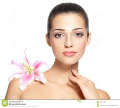 Beauty face of young woman with flower. Beauty treatment concept. Portrait over white background. MR: YES; PR: NO - beauty-face-young-woman-flower-beauty-treatment-concept-portrait-over-white-background-31577155