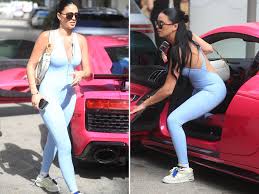 Camilla Araujo Turns Heads in Miami with Spandex Bodysuit and Pink Audi