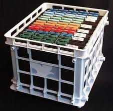 Whtie plastic crate with hangin file folers 