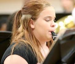 Image: Christy Murray helps with the holiday harmony on her clarinet. Christy Murray helps with the holiday harmony on her clarinet. (Barry Byers) - medium_IMG_0303