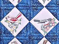 Résultat de recherche d'images pour "hand embroidered quilt with State Birds"