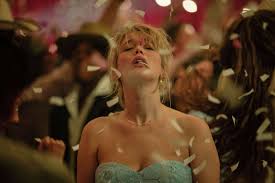 Jennifer Lawrence and Robert Pattinson share a moment at the Die My Love premiere