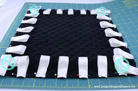 Résultat de recherche d'images pour "taggy blanket"