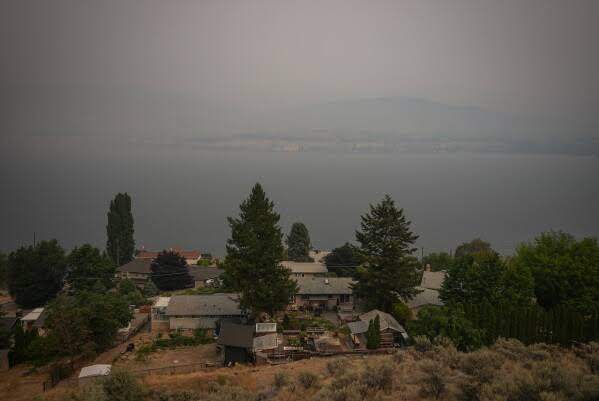 Wildfires burn across British Columbia's Okanagan, killing 1 and displacing thousands; Canada puts military on standby as Bald Range fire remains out of control