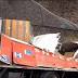 2 hurt after moving truck drives off overpass, report says