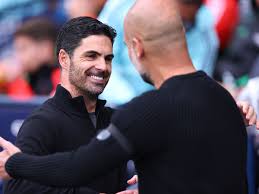 Mikel Arteta smiling while hugging Pep Guardiola