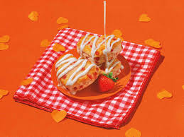 Popeyes' Limited-Time Delight: Heart-Shaped Strawberry Biscuits Now Available! - 1