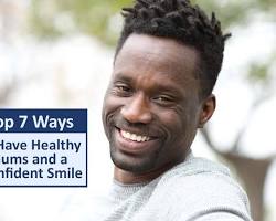 Image of person smiling confidently with healthy gums