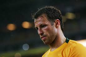 Lucas Neill of the Socceroos looks on during the 2010 FIFA World Cup qualifying match between the Australian Socceroos and ... - Australia%2Bv%2BUzbekistan%2B2010%2BFIFA%2BWorld%2BCup%2B6WrFFjZEYpal