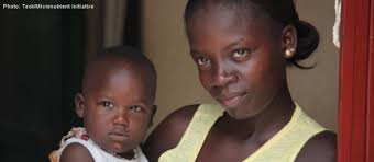 Addressing the <b>Global Health</b> Issue of Zinc Deficiency - Teck-2012-Mother-with-child-700x300-21812eca26ec28d3df27b904ebb1a9d9