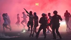 French police arrest 780 after violent clashes as PSG fans celebrate Champions League win