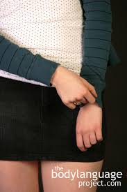 Image result for body language elbow hold