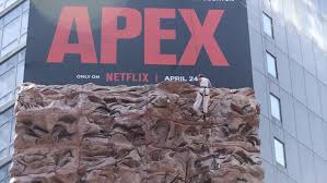 Charlize Theron Climbs the Walls in Times Square to Promote New Movie 'Apex'