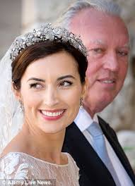 The bride Claire Lademacher and her father Hartmut Lademacher arrive for the religious wedding - article-2427976-1822B6C000000578-363_306x423