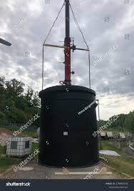 Liquid Storage Tank Lifted Through Air Stock Photo ...