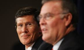 Bank of America chief Ken Lewis (right) speaks as Merrill Lynch CEO John Thain looks on. Photograph: Mario Tama/Getty Images - Ken-Lewis-and-John-Thain-001