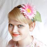 Heidi Gustad is an experienced DIY blogger who is the Founder &amp; Editor of HandsOccupied.com. Hands Occupied is a craft blog sharing projects, ... - small_square_daisyheadband11