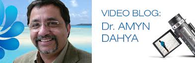 Dr. Amyn Dahya + video camera - banner_videoblog_amyn