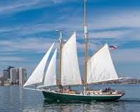 Image of Boston Harbor with sailboats, Quincy Market, and the Old North Church