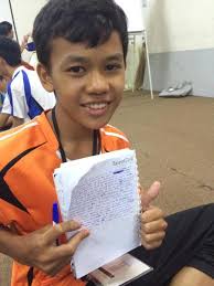 The Inspire Southeast Asia camp gave English lessons to participants like Muhammad Aqil, 14, pictured here writing during the &#39;Dear Diary&#39; session. - bratssea2