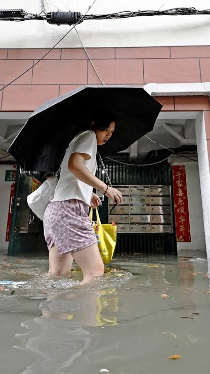 Typhoon Dolphin weakens but disrupts travel in east China; hundreds of flights canceled as flooding hits Zhejiang